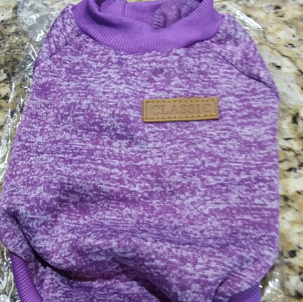 Little doggie coat in purple never used.